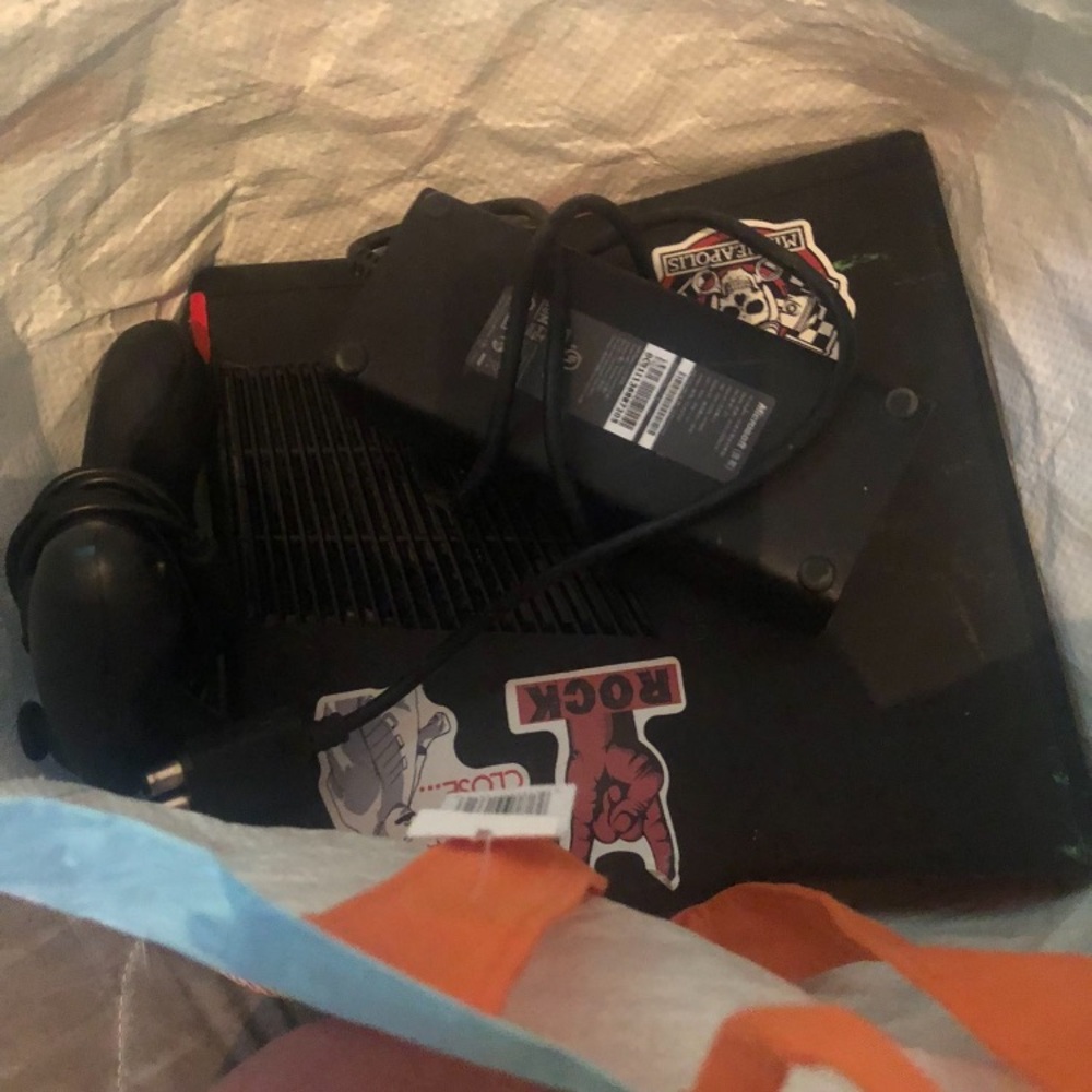 Black Gaming Console with Stickers
Pick up in 314 E Loveland ave